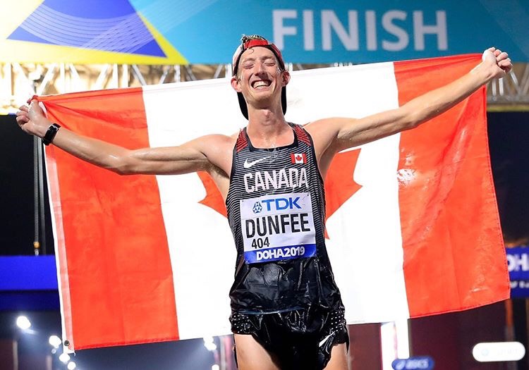 Evan Dunfee after crossing the line in Doha to win the bronze medal. Photo credit: Andy Lyons/IAAF