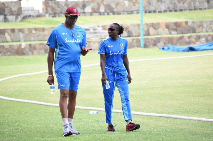 Courtney Walsh in discussion with Women's Cricket Captain Stafanie Taylor