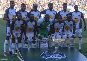 TP Mazembe's team pose before the first leg of the CAF champions league semi final football match between Tunisias Esperance Tunis and DR Congos Tout Puissant Mazembe at the Olympic stadium of Rades on April 27, 2019