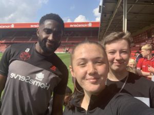 Madi Highfield with Walsall defender Manny Monthe