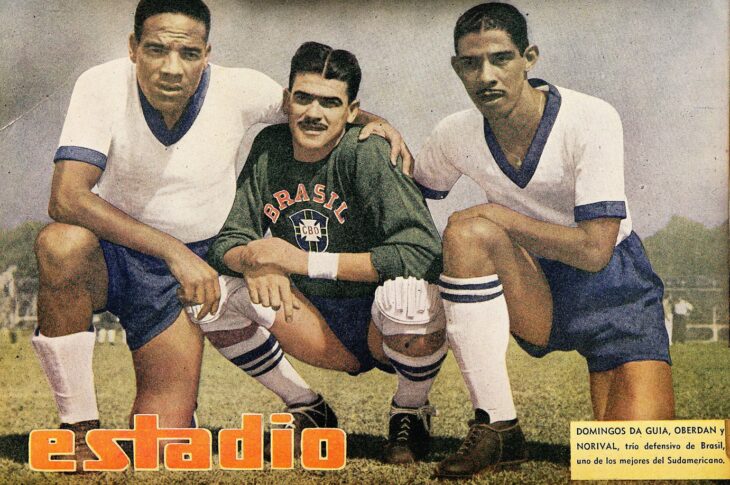 Brazilian defensive trio crouch to pose for Estadio magazine.