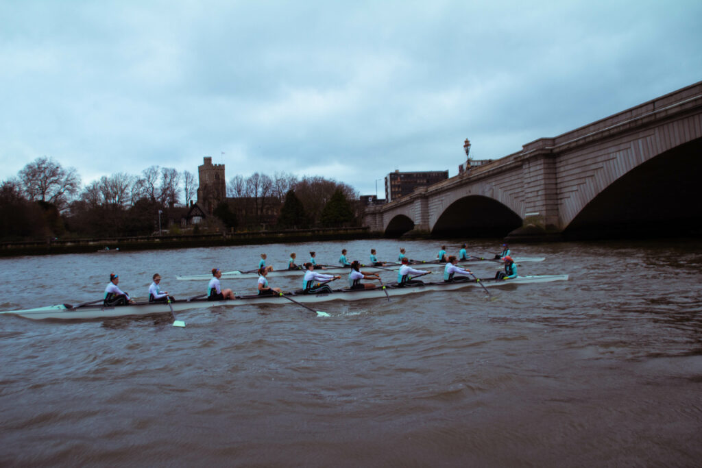 Cambridge University Women's crews line up at Putney Bridge.