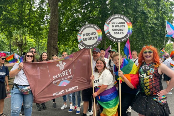 Members of Proud Surrey and ECB staff marching together at Pride London 2022