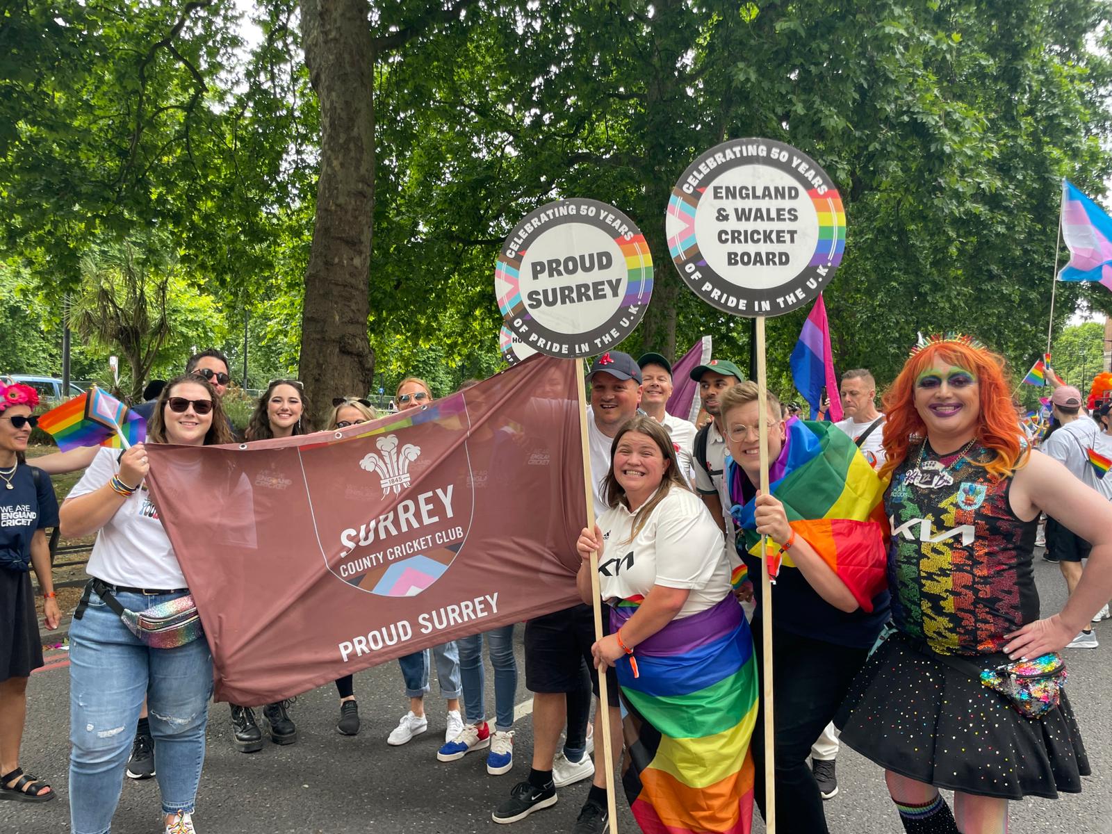 Members of Proud Surrey and ECB staff marching together at Pride London 2022